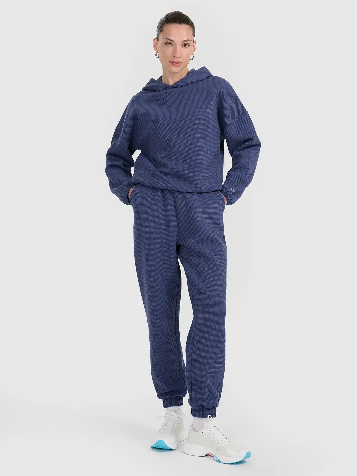 4F spodnie z dzianiny o waflowym splocie 4FWAW25TTROF1184 niebieskie (XS)